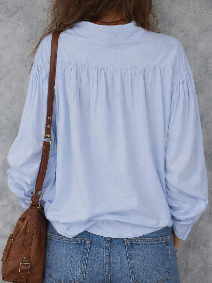 Women's cotton ruffle cuff blouse - side view