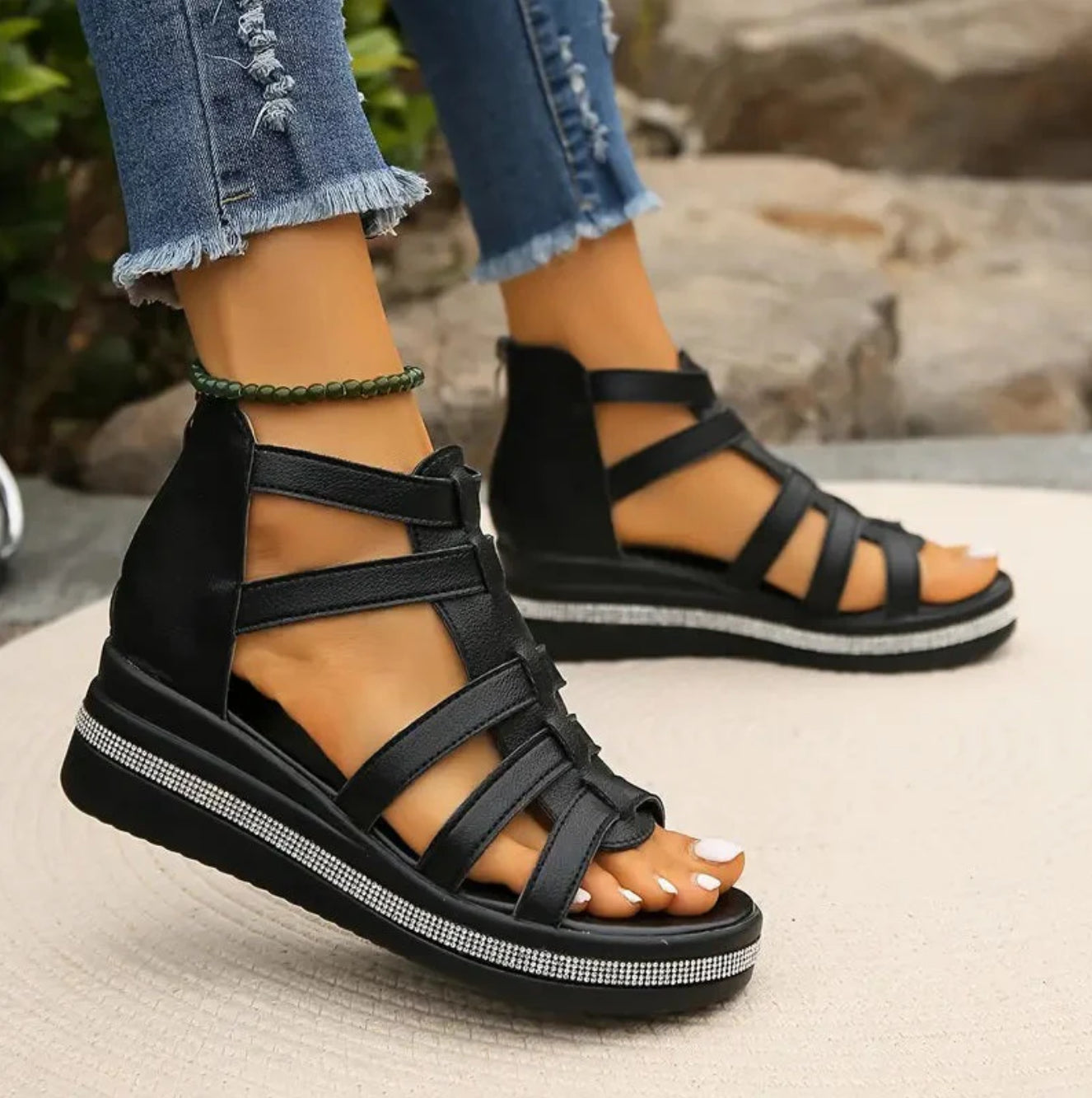 Women's rhinestone embellished sandals flat lay view