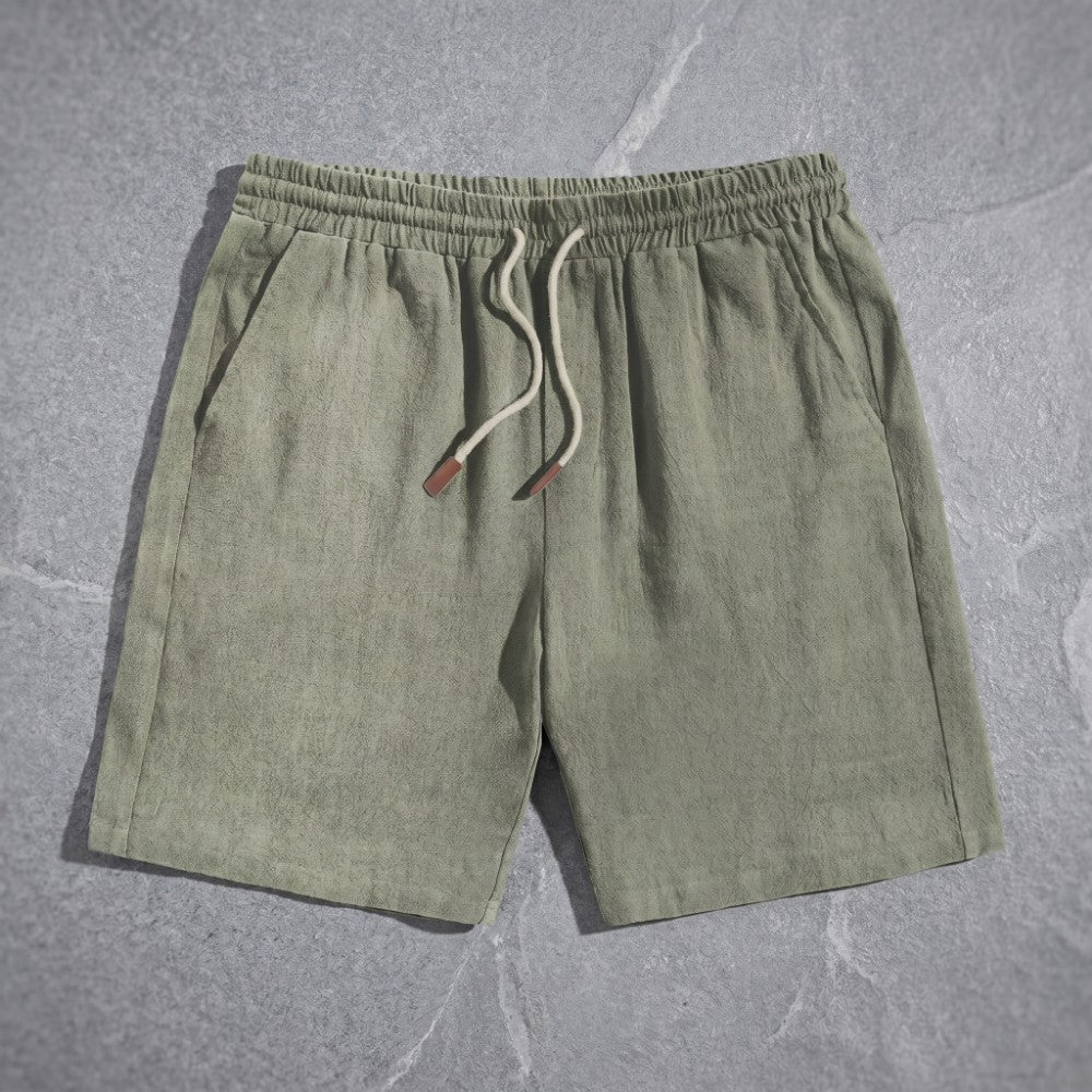 mens linen drawstring shorts | casual summer beach shorts - lifestyle view