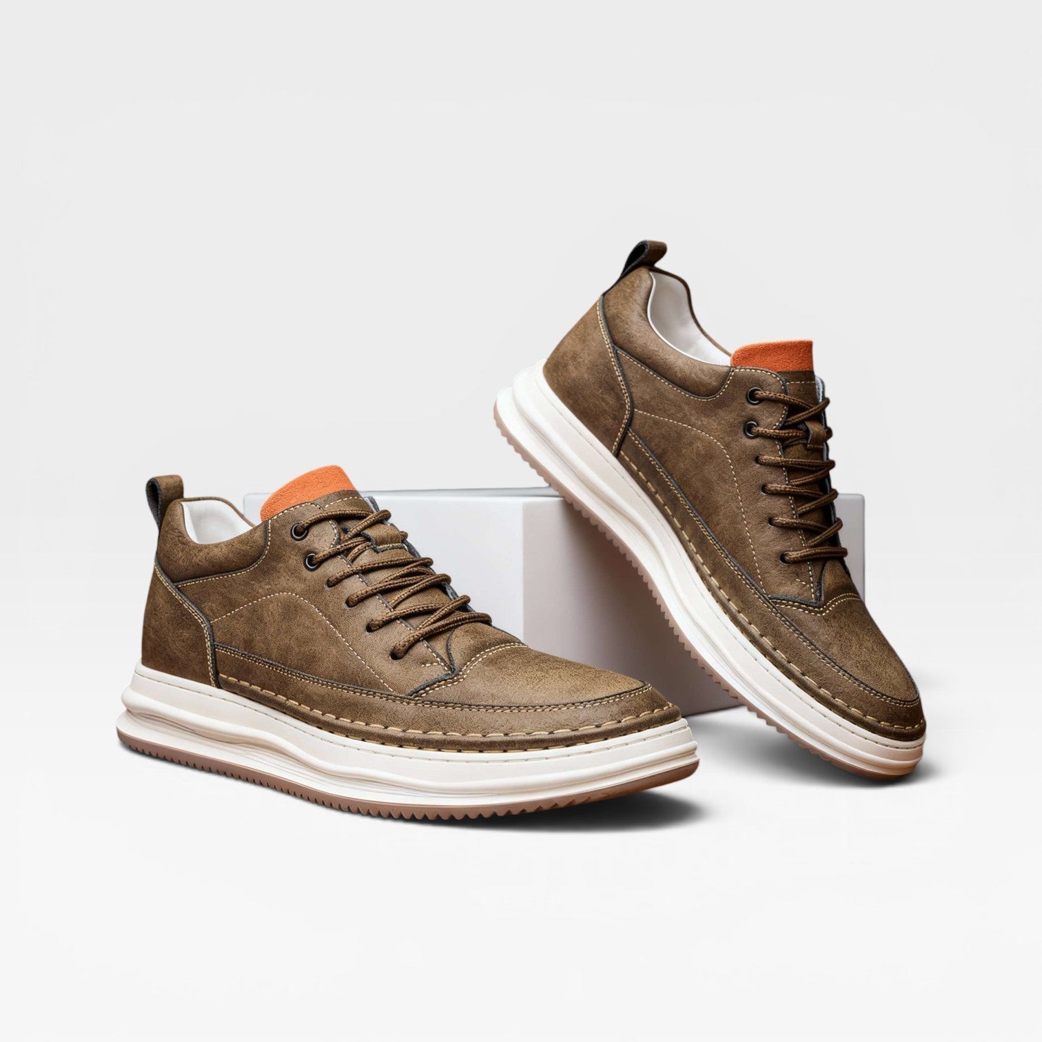 Men's burnished leather trainers hand-stitched detail close-up