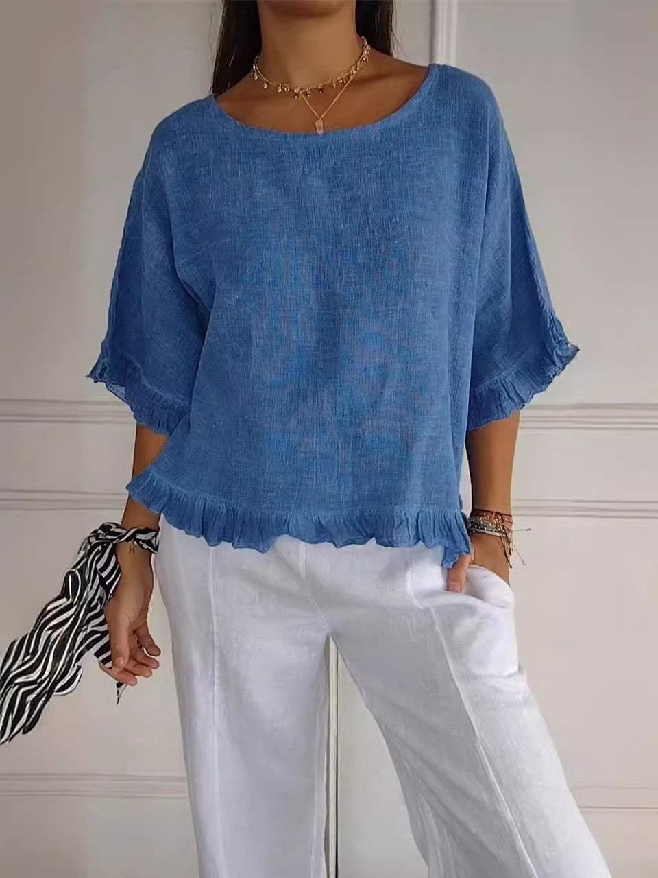 Women's ruffle-hem short-sleeve blouse - side view